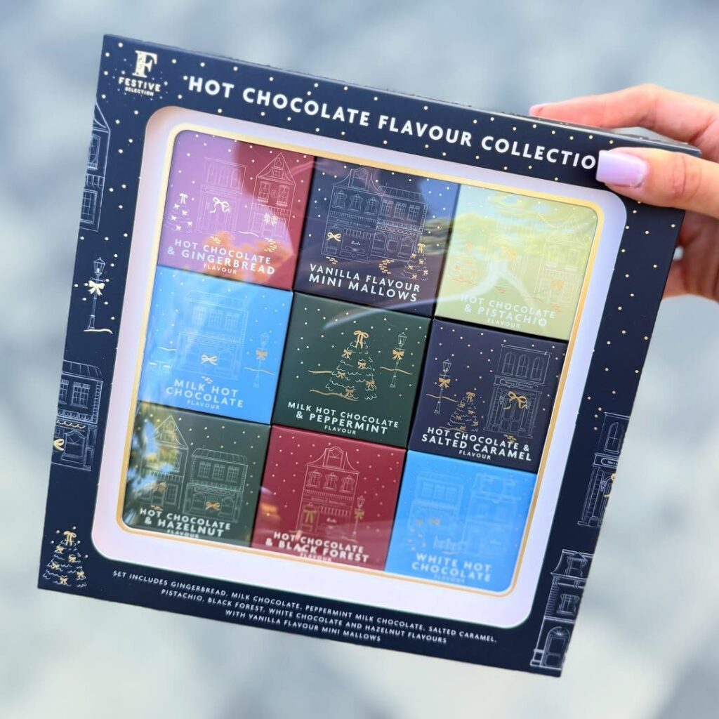 Hot chocolate flavour collection gift box with nine colorful square cocoa tins.